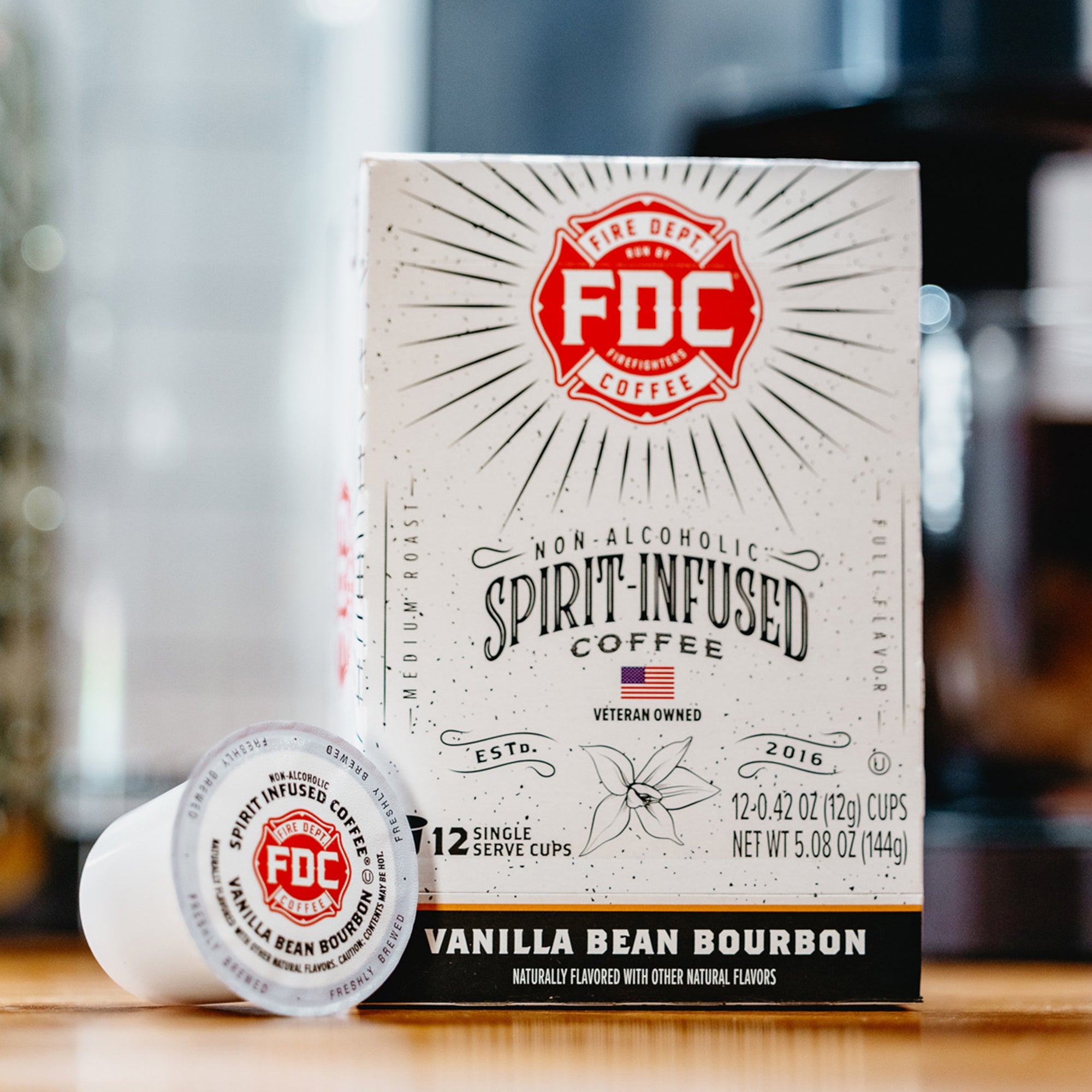A 12 count box of Fire Department Coffee's Vanilla Bean Bourbon Infused Coffee Pods