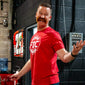 Fenton wearing the Fire Department Coffee Red Shirt